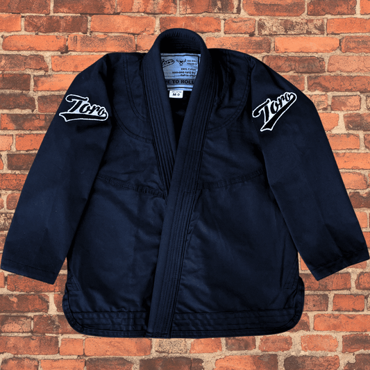Toro Kids "Black Bull" Ultra Light BJJ Gi jacket in black with Toro shoulder patches