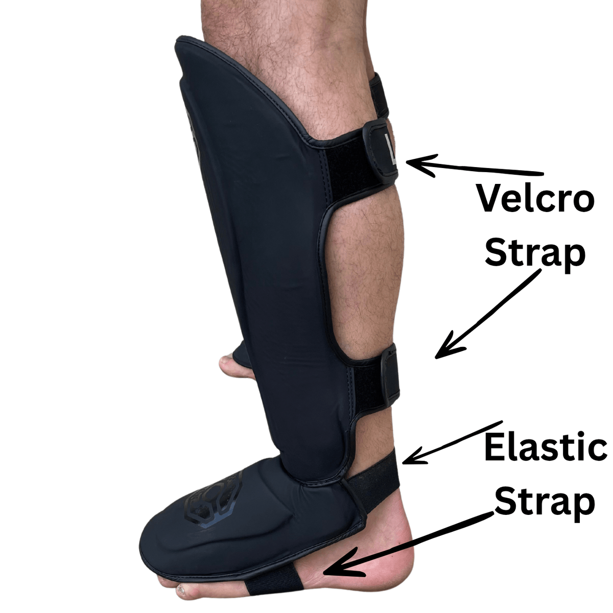 Cageside Steel Carbon Pro Spar Shin Guard with two rear straps and elastic under-foot strap
