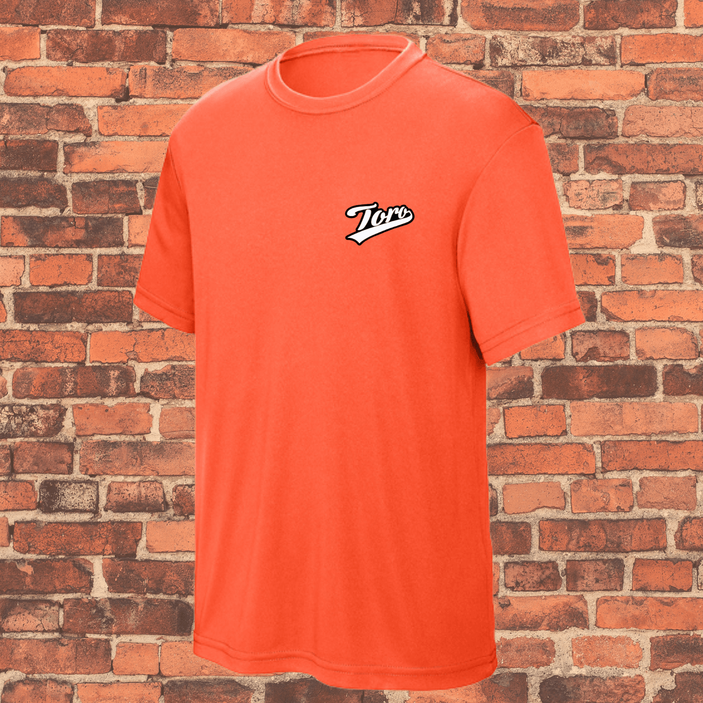 Ranked youth BJJ rash guard in orange with Toro logo, loose fit short sleeve shirt for jiu-jitsu kids and teens