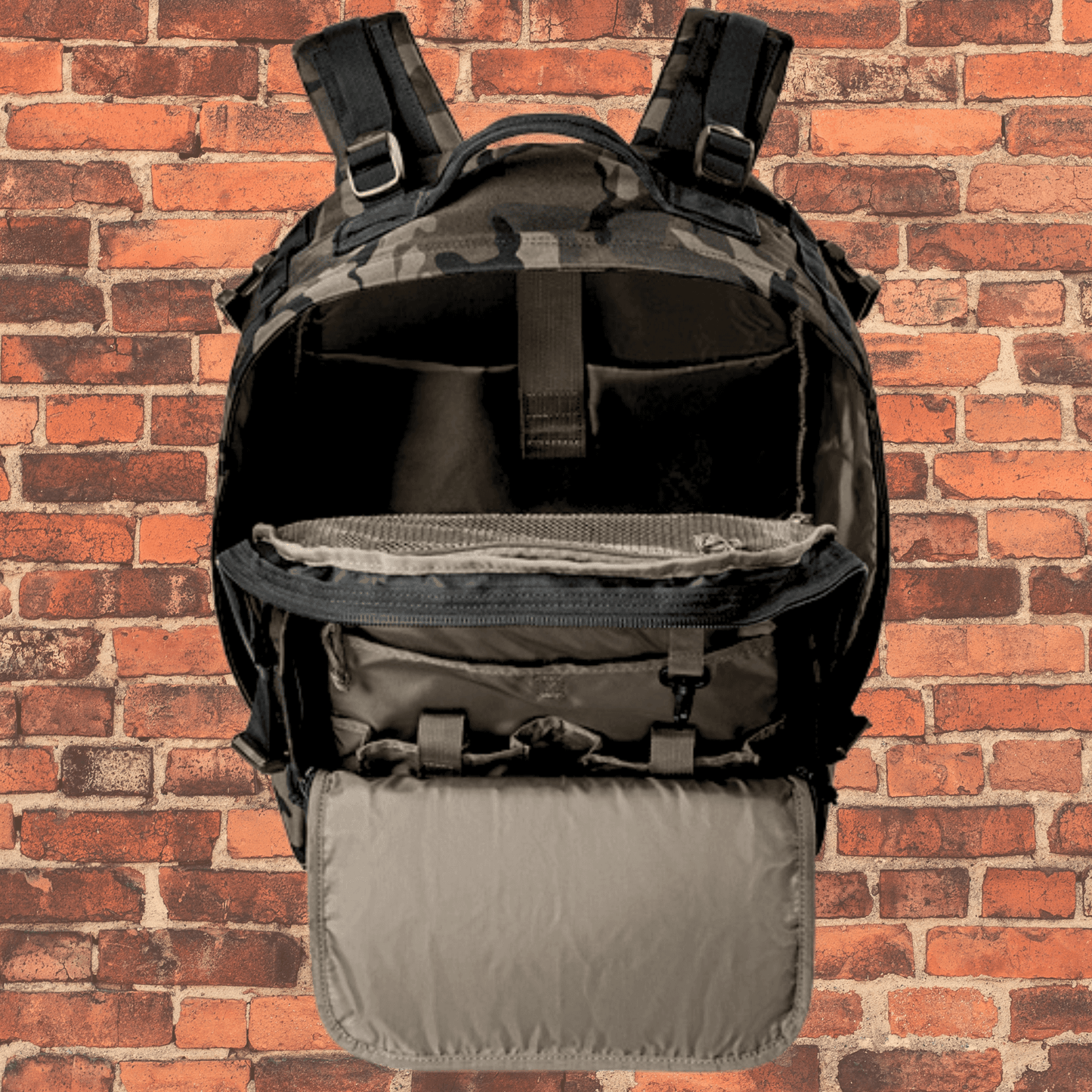 Inside view of Toro Large Tactical Backpack Dark Camo showing padded laptop sleeve and spacious main compartment.