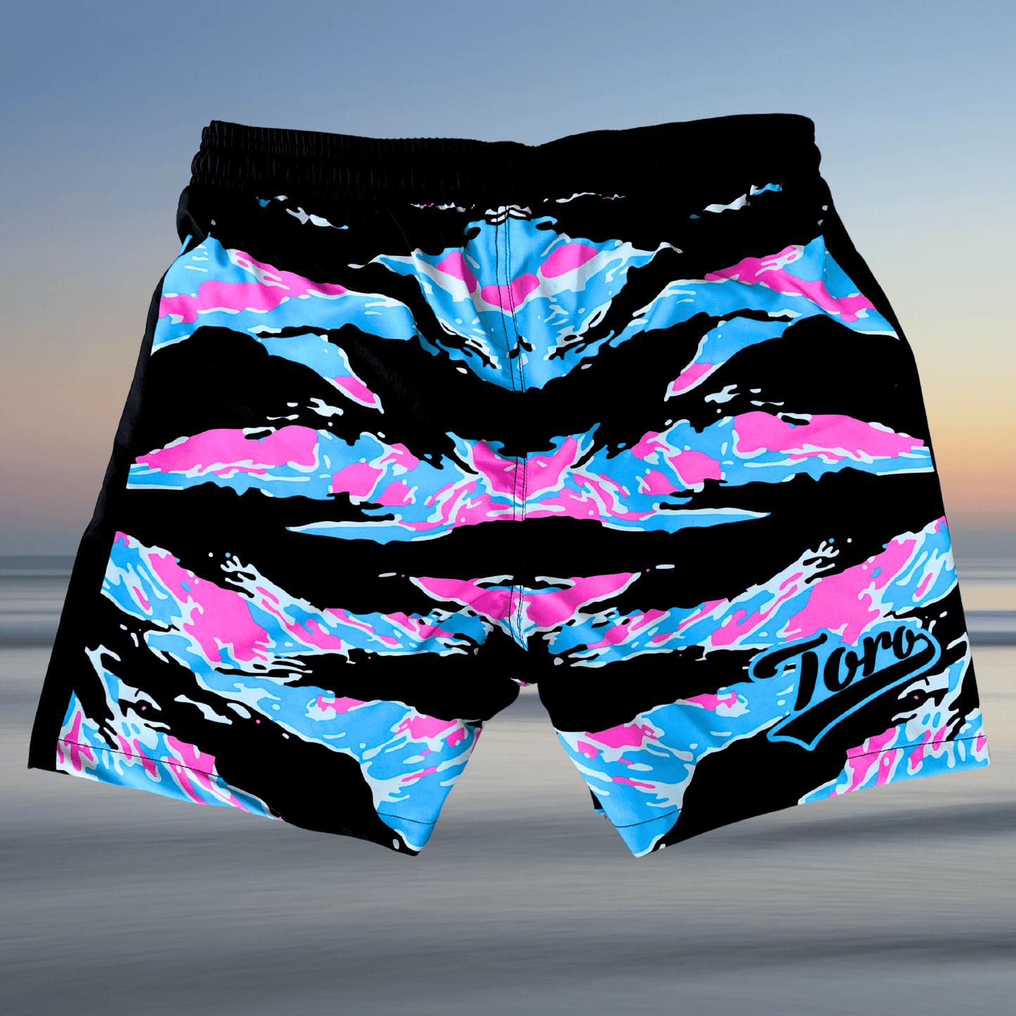 Back view of Toro BJJ Miami Camo fight shorts with pastel pink, aqua, and black camo design