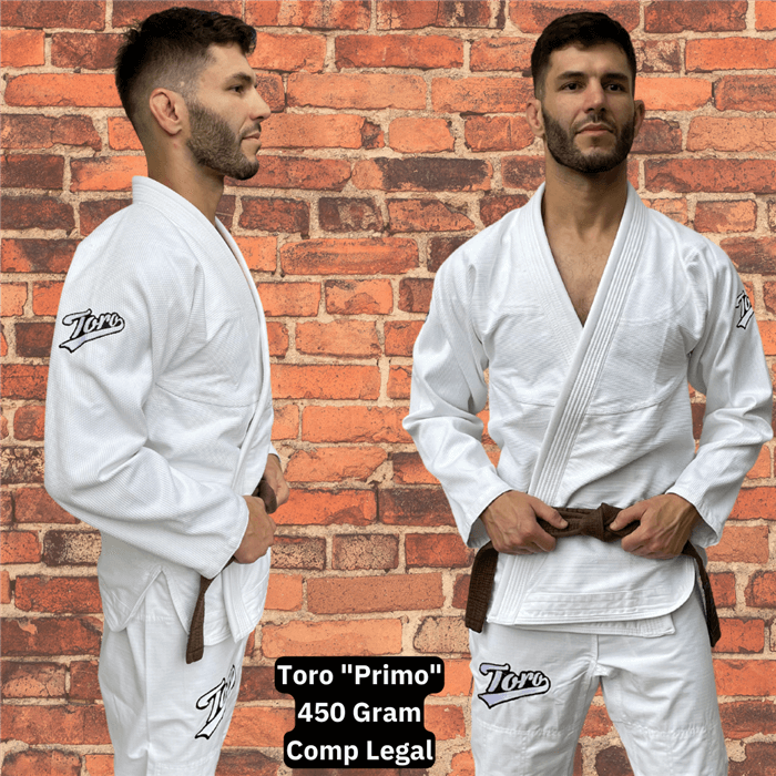 Two views of a male athlete wearing the Toro Primo White BJJ Gi with a brown belt, front and side stance, against a brick wall background, with text highlighting it as 450 gram and competition legal.