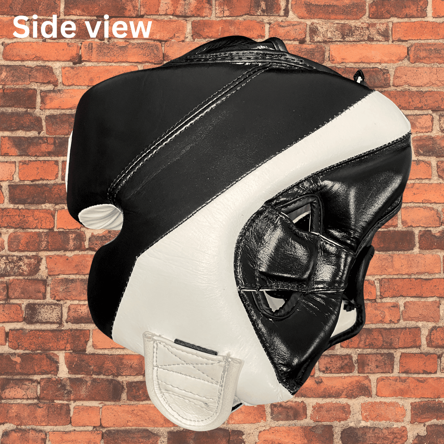 Side profile of genuine leather Cageside sparring headgear with ear protection and chin strap