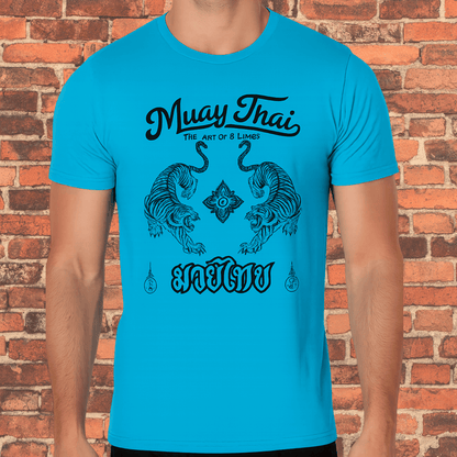 A turquoise tri-blend t-shirt featuring a black Muay Thai design with two symmetrical tigers, a central floral emblem, and "Muay Thai The Art of 8 Limbs" text on a red brick background.