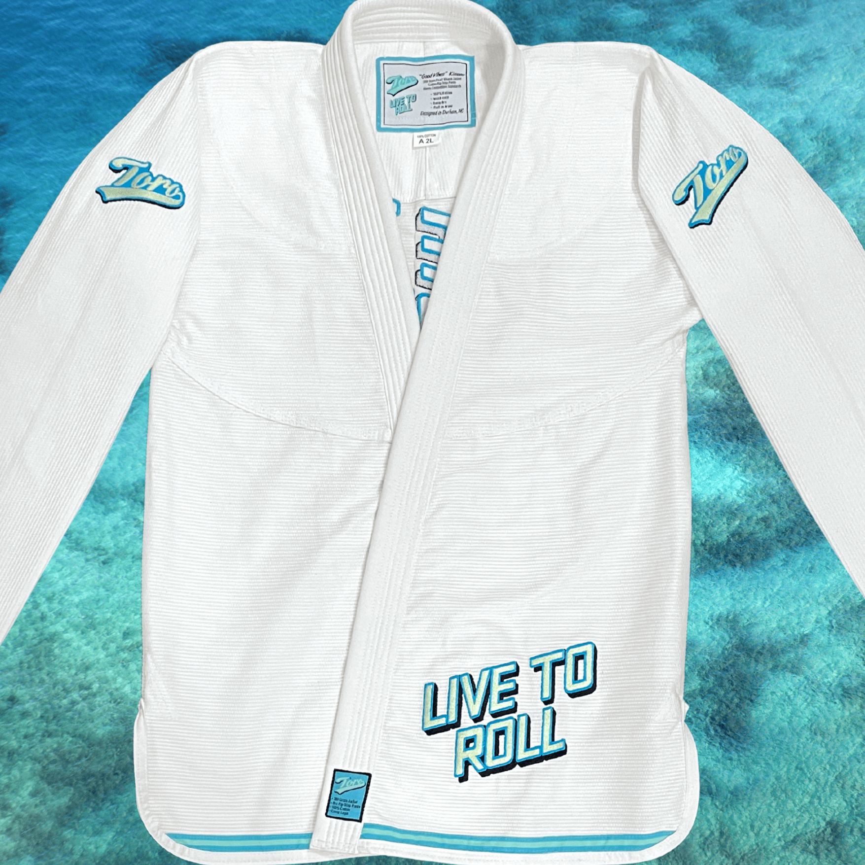 Front of Toro Good Vibes BJJ Gi jacket with Live to Roll embroidery and Toro shoulder logos