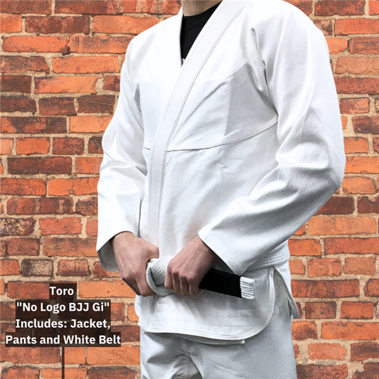 Person wearing Toro No Logo BJJ Gi in white, holding a white belt. Includes jacket, pants, and belt, perfect for BJJ training.