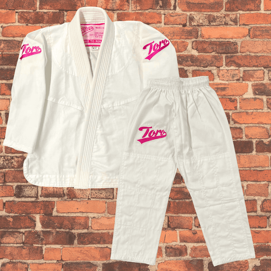 Toro Kids Barbie ultra light youth BJJ gi in white with pink logos, jacket and pants set