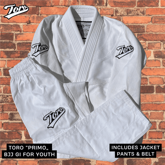 Toro Primo 4 youth BJJ gi in white with jacket, pants, and belt IBJJF legal