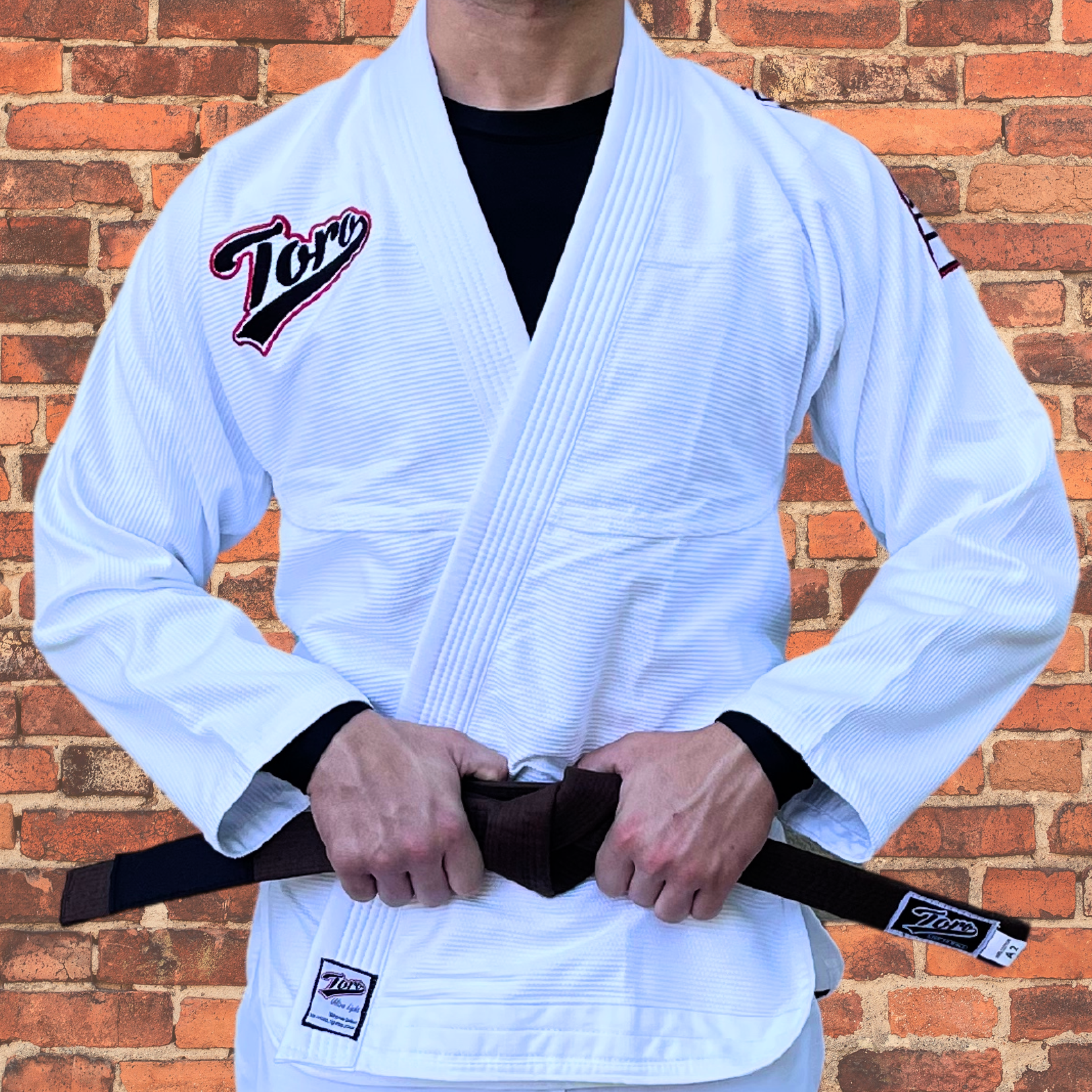 BJJ practitioner wearing lightweight white Toro BJJ Gi for competition