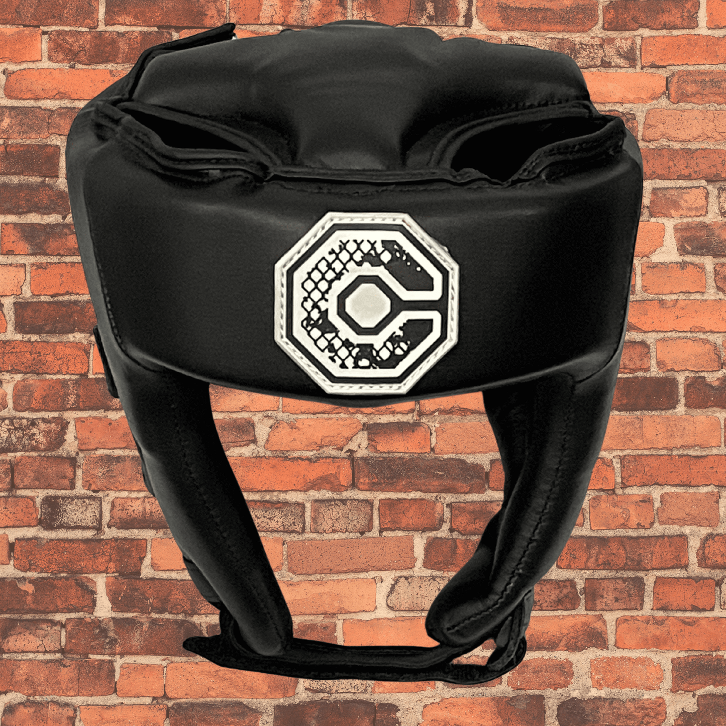 Cageside Competition Headgear front view with Cageside logo on black leather padding