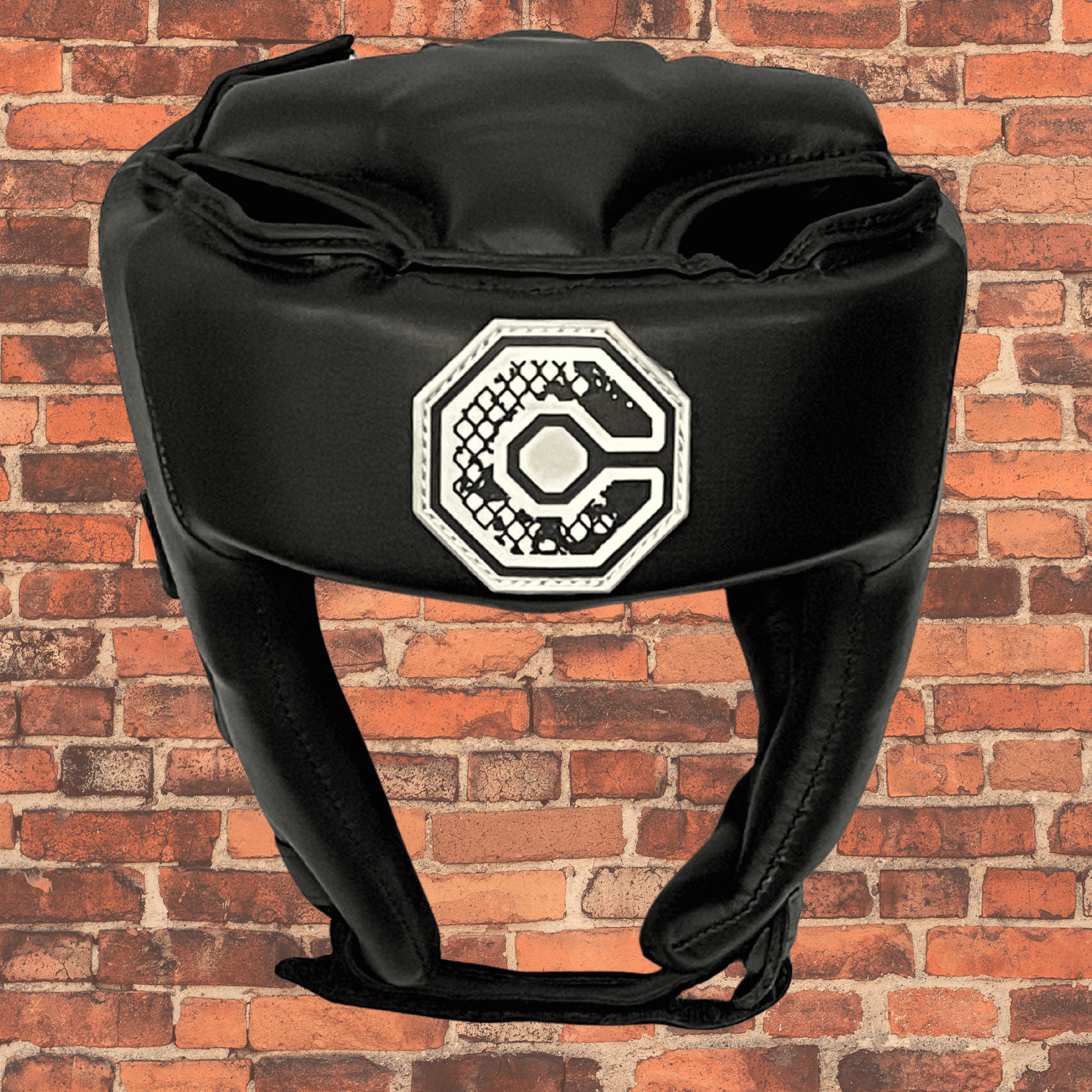 Cageside Competition Headgear front view with Cageside logo on black leather padding