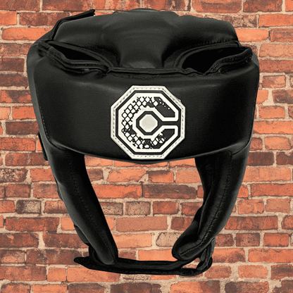 Cageside Competition Headgear front view with Cageside logo on black leather padding