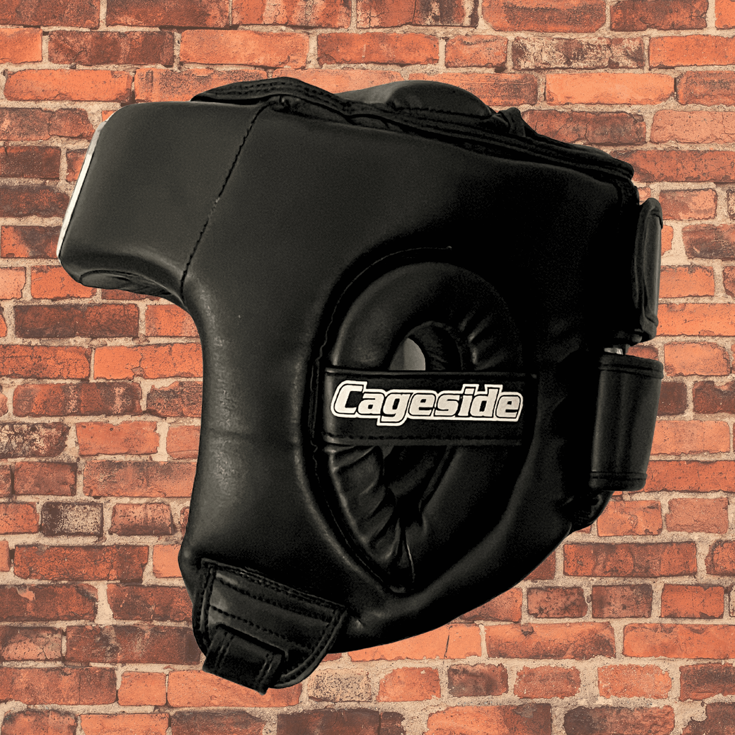 Cageside Competition Headgear side view with padded ear protection and Cageside logo
