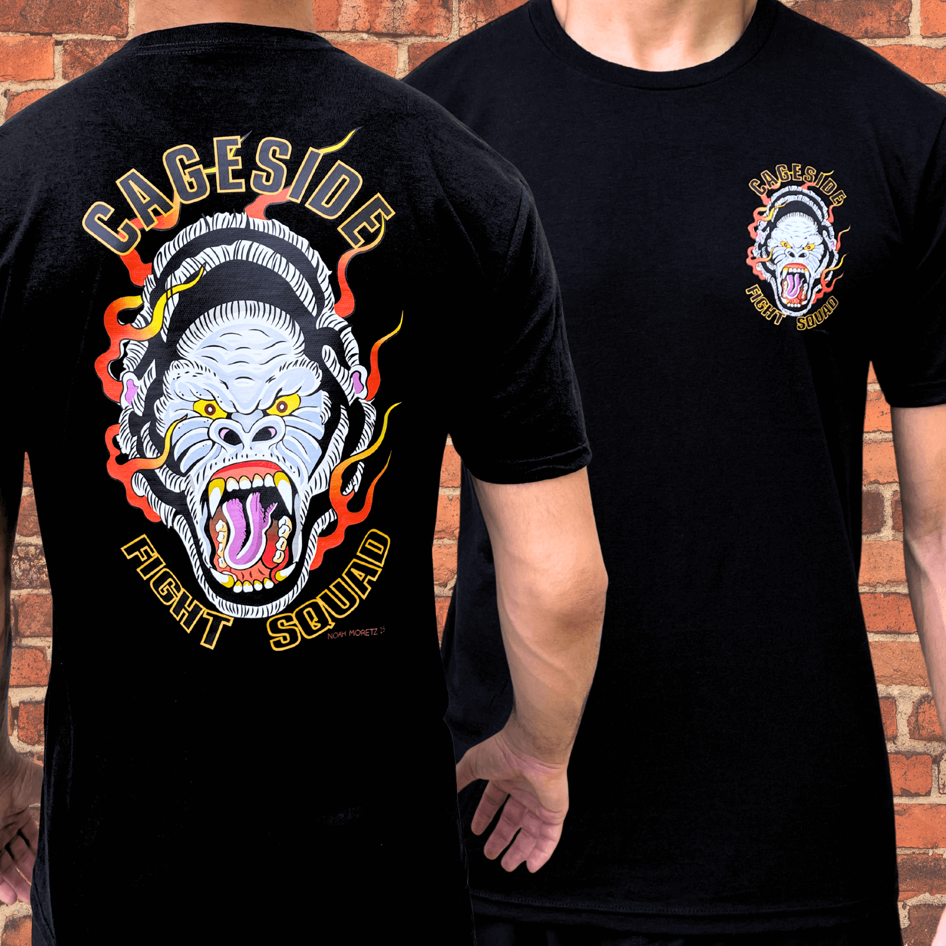 Black Cageside Fight Squad t-shirt showing front chest logo and large flaming gorilla graphic on the back, modeled against a brick wall