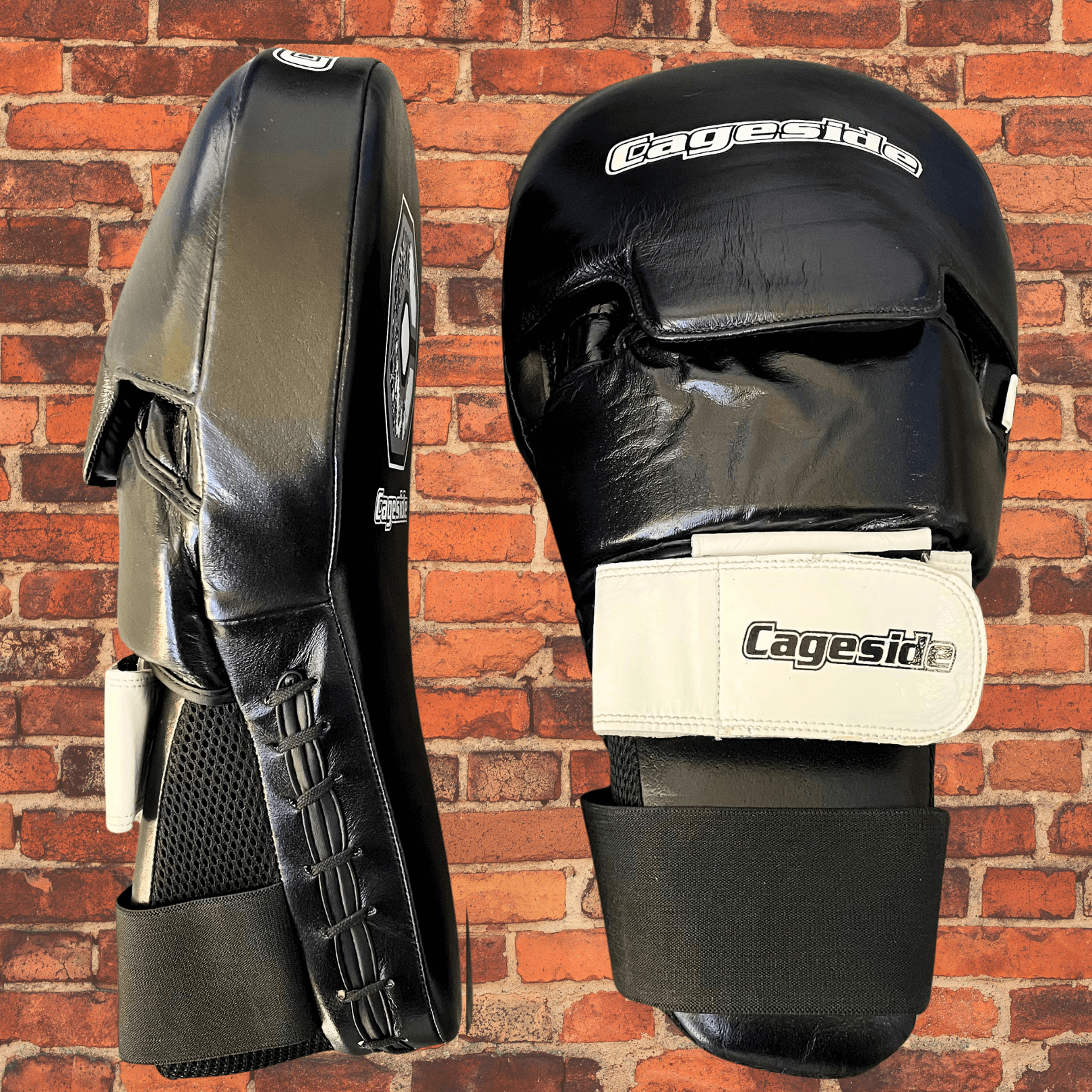 Cageside Hybrid Mega Mitts showing black leather side view and front with logo strap