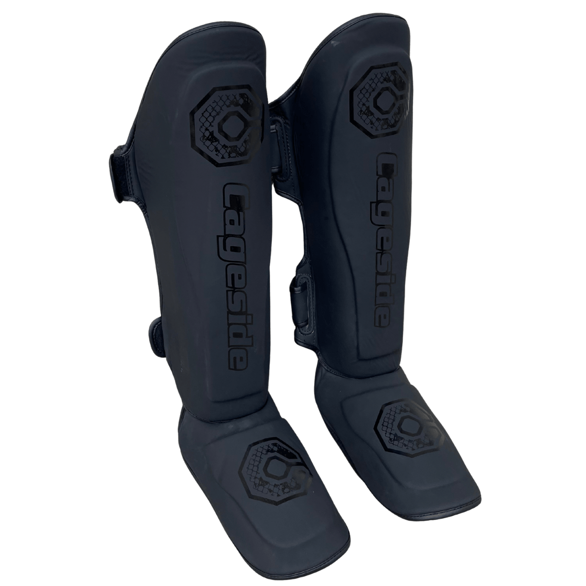 Cageside Steel Carbon Pro Spar Shin Guards in black and dark gray