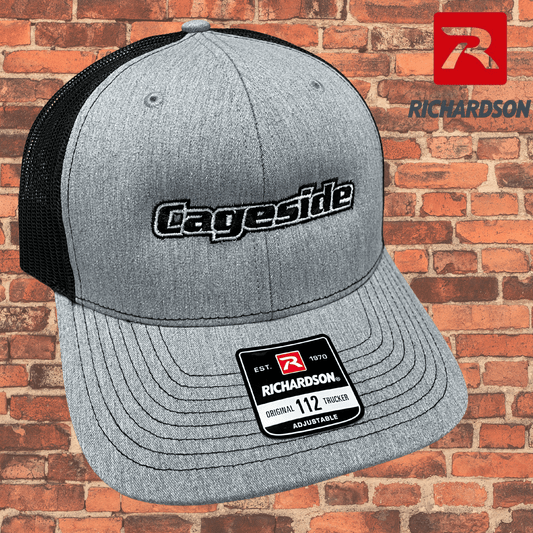 Cageside Richardson 112 trucker hat with embroidered logo, gray front panel and black mesh back
