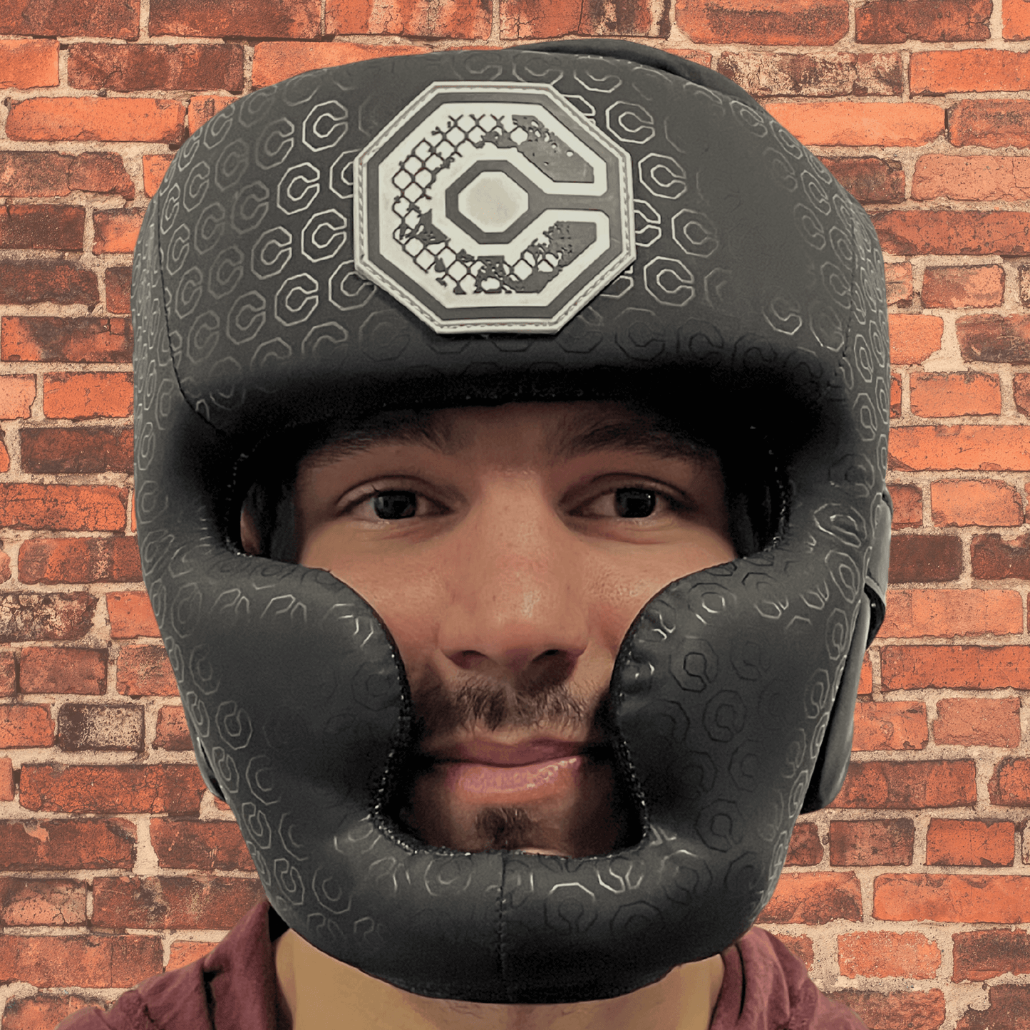 Cageside Full Face Sparring Headgear front view worn by athlete, showing full coverage protection