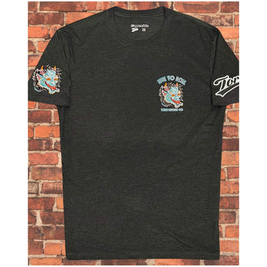 Black T-shirt featuring a blue and red dragon design with "Live to Roll" on the chest and sleeve, plus Toro branding on the opposite sleeve.