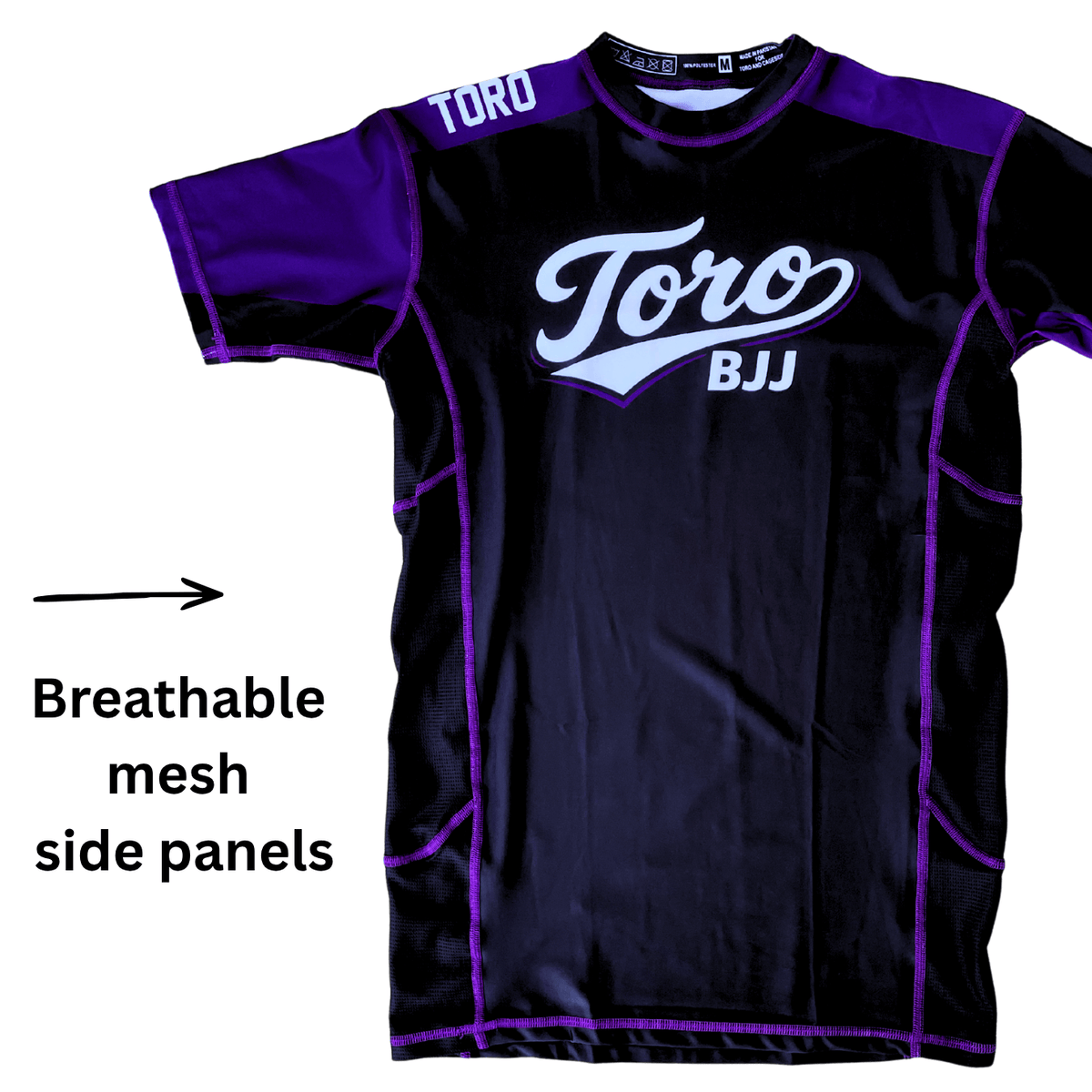 Toro 2027 purple belt rash guard with an arrow highlighting breathable mesh side panels