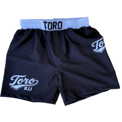 Front view of black Toro 2027 Super Short BJJ shorts with a white waistband and white logos
