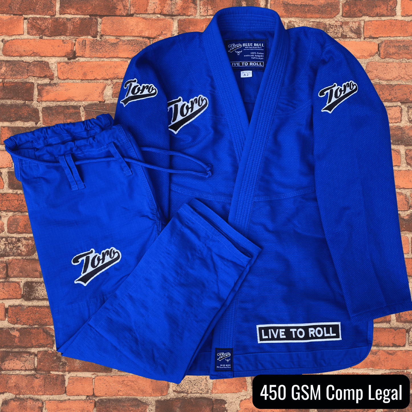 Men’s Toro BJJ Blue Bull Gi set with 450 GSM jacket and pants, white Toro patches, Live to Roll patch, IBJJF competition legal.