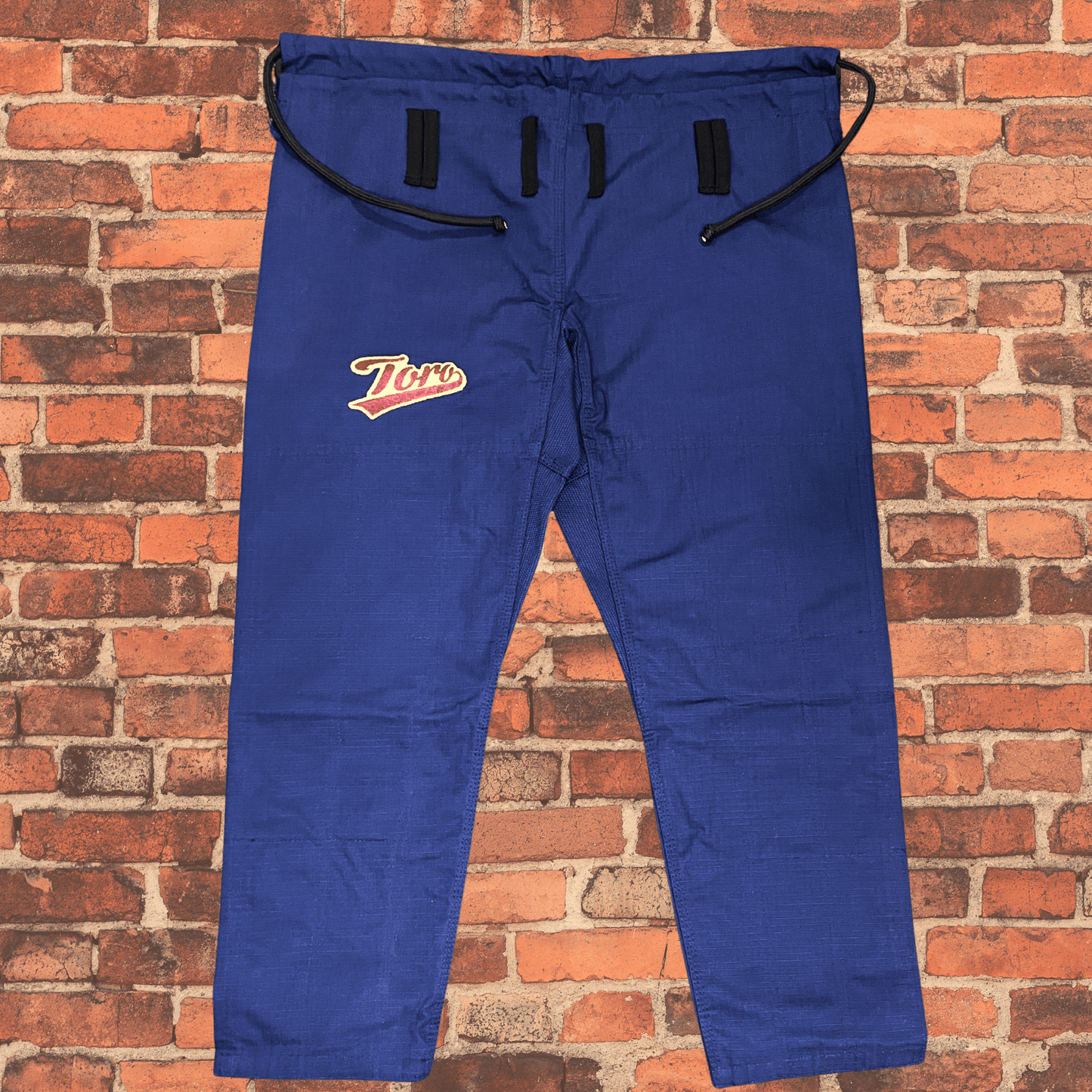 Navy Blue BJJ Gi pants with Toro logo patch, Toro BJJ Coyote Gi lightweight 380gsm with brown stitching