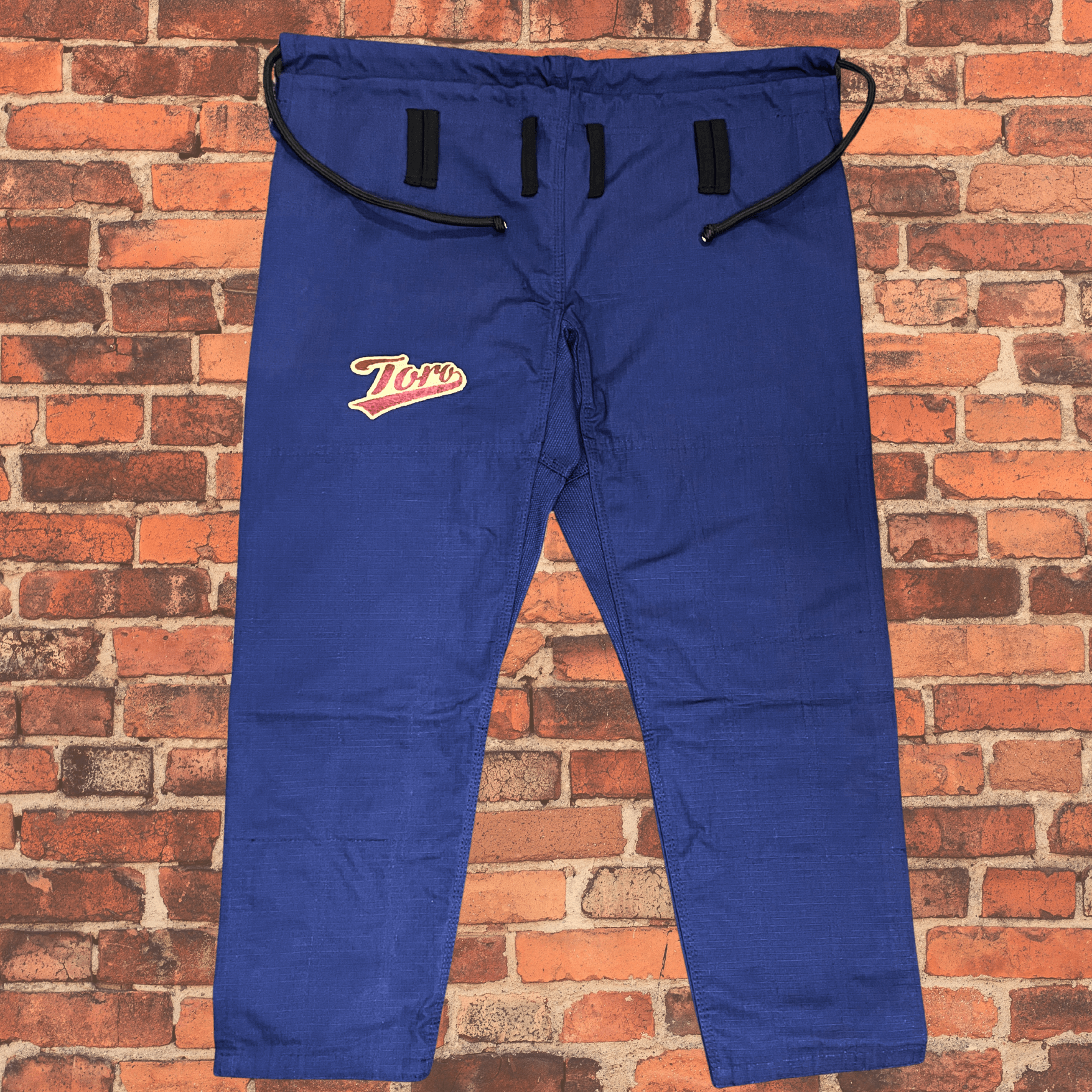 Navy Blue BJJ Gi pants with Toro logo patch, Toro BJJ Coyote Gi lightweight 380gsm with brown stitching
