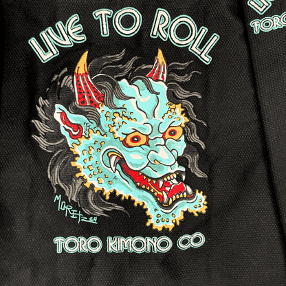 Green Oni BJJ Gi detailed Oni embroidery with Live to Roll text, IBJJF approved