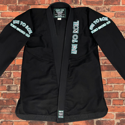 Green Oni BJJ Gi front view jacket with Live to Roll embroidery, IBJJF approved