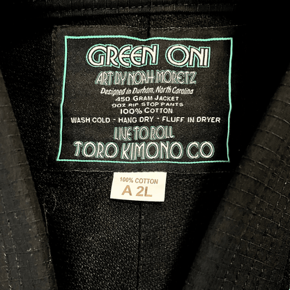 Green Oni BJJ Gi inside collar label showing 450 GSM mid-weight and IBJJF approval