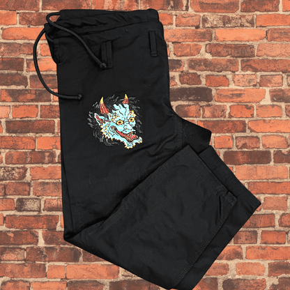 Green Oni BJJ Gi pants with embroidered Oni face design, IBJJF approved
