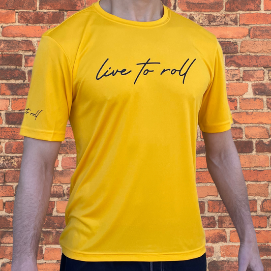 Toro BJJ Loose Fit Rash Guard in gold, featuring “Live to Roll” text on chest and sleeve, short sleeve design for NoGi Jiu-Jitsu and under your BJJ gi
