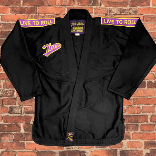 Black BJJ Gi with purple and gold patches, Toro logo, IBJJF approved Purple & Gold Gi