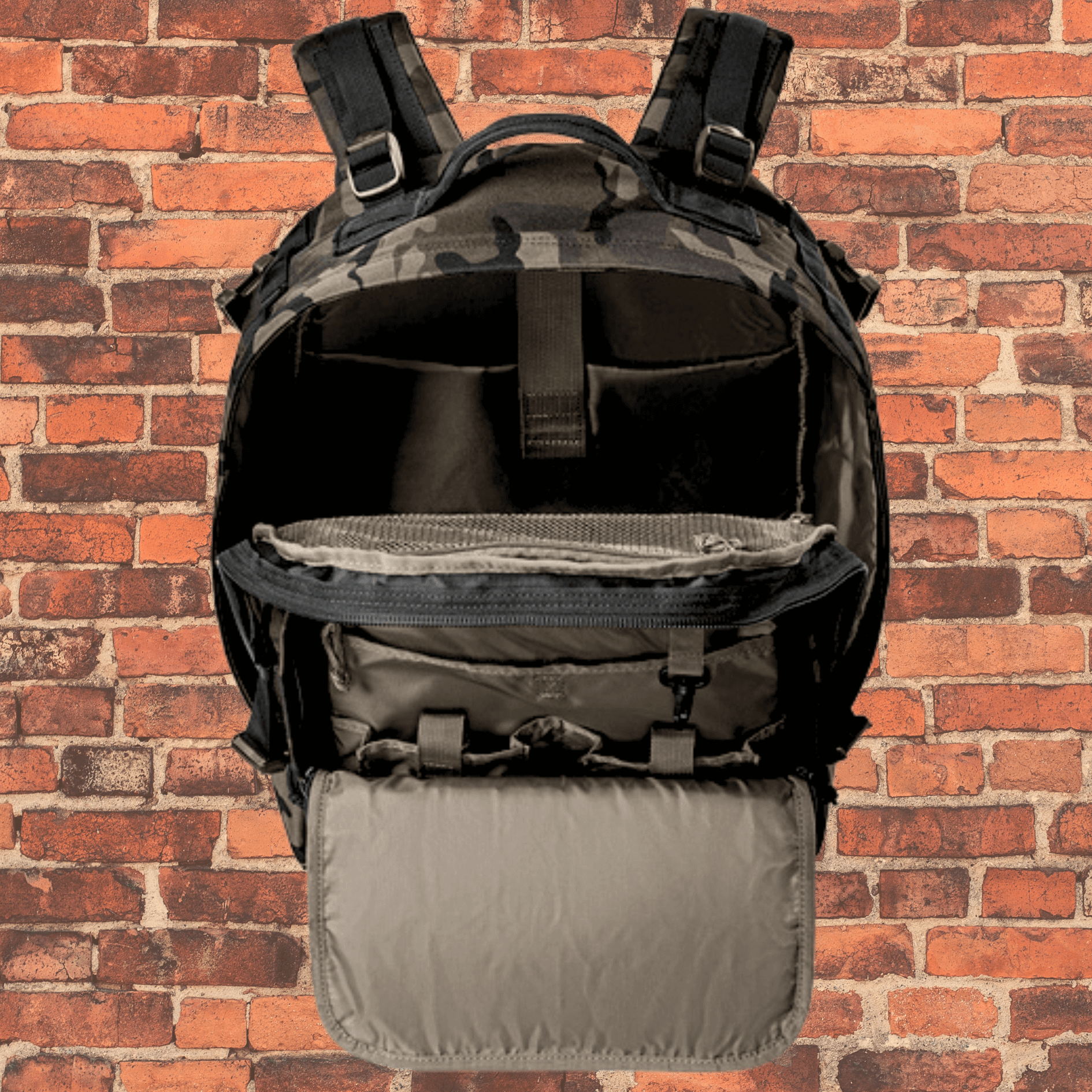 Inside view of Toro Large Tactical Backpack Dark Camo showing padded laptop sleeve and spacious main compartment.