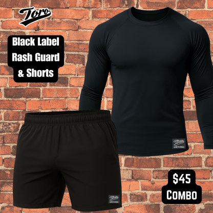 All black Toro BJJ long sleeve rash guard and shorts combo against brick wall background, $45 Black Label NoGi set.