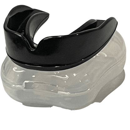 Black boil and bite mouth guard displayed on clear case